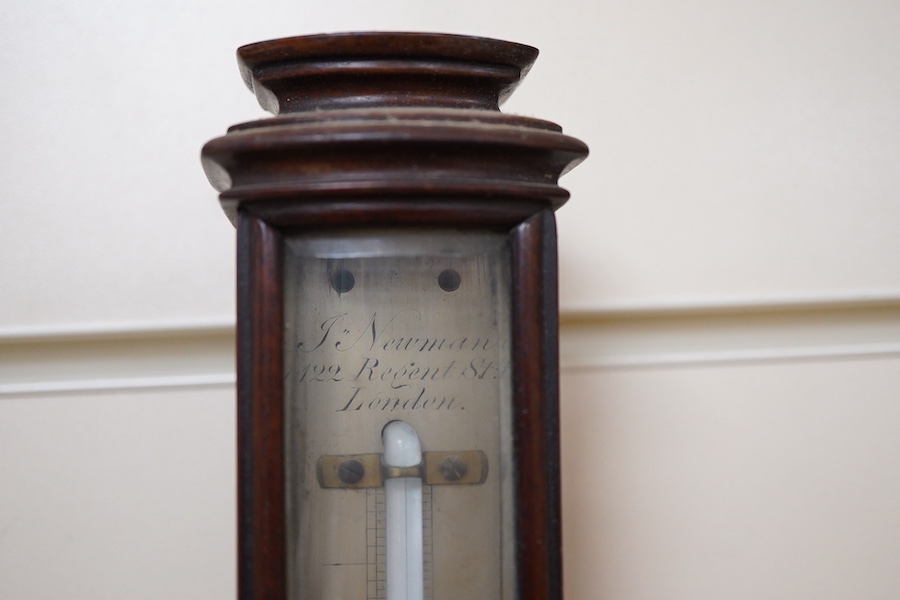 A Georgian mahogany cased thermometer by J. Newman, 122 Regent St., London, with silvered scale and bevelled glass front, 44.5cm high